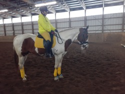Eagle with Ruth Harris riding her favorite school horse with his YELLOW clothes on!